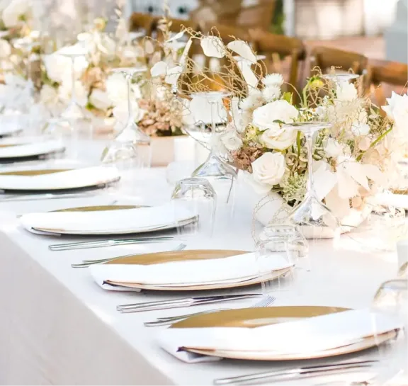 Floral dining table with white place settings